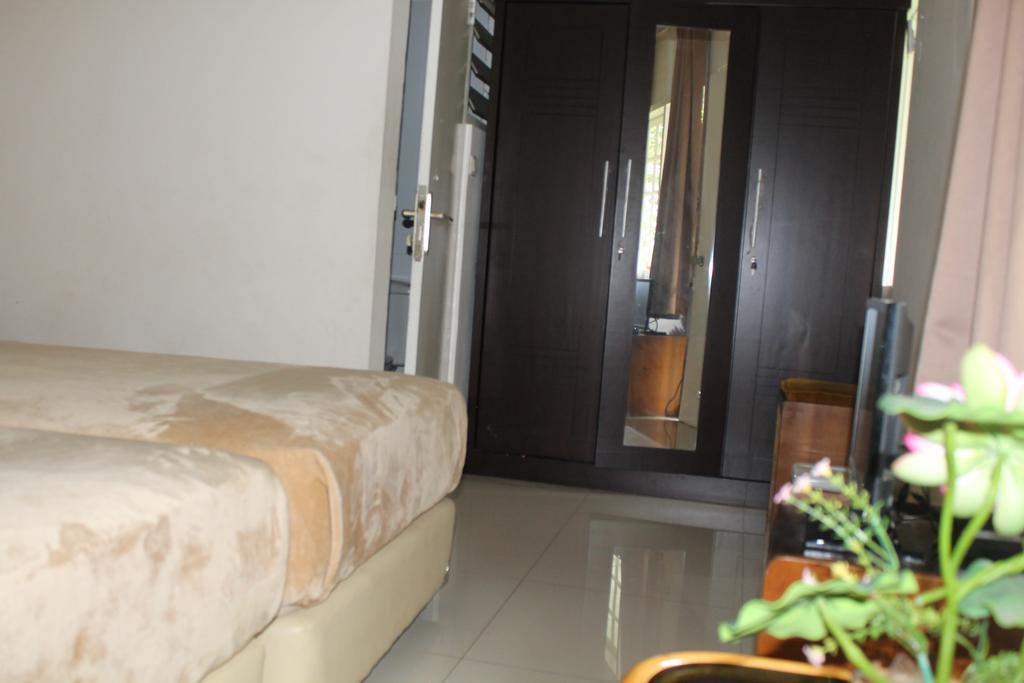 Gondia Guesthouse Jakarta Szoba fotó