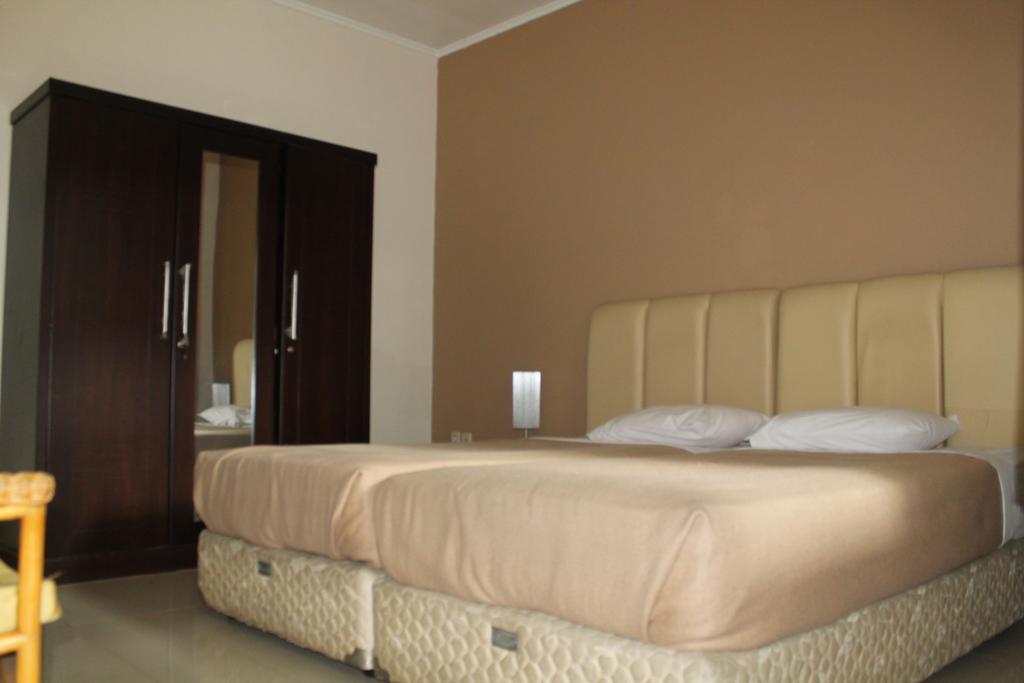 Gondia Guesthouse Jakarta Szoba fotó